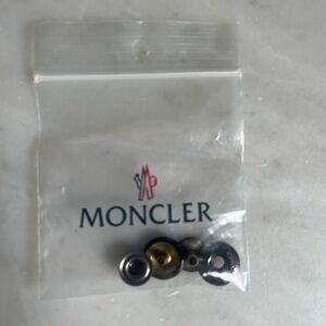 Moncler replacement snaps and buttons for ladies vest or jacket.